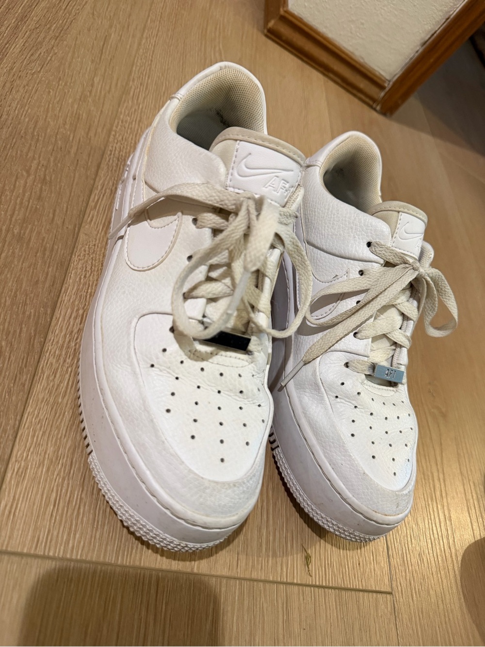Nike women’s White Leather Sneakers - Classic Air Force Style